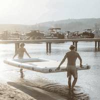 Thumbnail for 2 People carrying a POP AquaDock 14' × 7' Inflatable Floating Dock Platform 