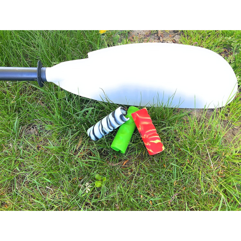 3 Seattle Sports Removable Silicone Kayak Paddle Grip beside a paddle