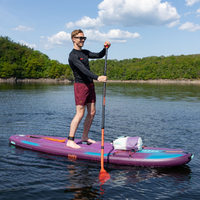 Thumbnail for A. man riding a Aero Yarra 10’6” Inflatable Paddle Board iSUP Purple