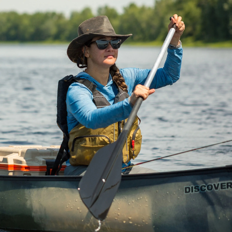 A Person using Carlisle Economy Canoe Paddle for rowing a Kayak