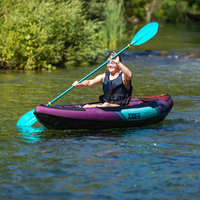 Thumbnail for A person rowing Croft Inflatable Kayak Purple