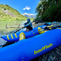 Thumbnail for A person sitting on a Badfish 11’10” x 5’6 Hammer Paddle Cat Inflatable Boat Raft