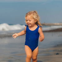 Thumbnail for A child after using Badger SPF 40 Kids 2.9 oz Mineral Sunscreen Cream