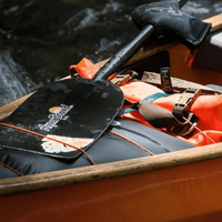 Thumbnail for A hand holding a AQUA BOUND Edge Carbon Canoe Paddle