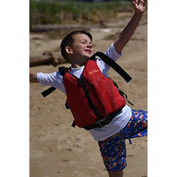 Thumbnail for A happy boy wearing Old Town Inlet Jr Kids' Foam Life Jacket – Red