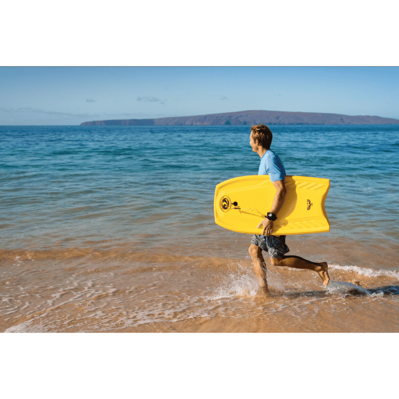 A man carrying a CBC 42" Elite Bodyboard