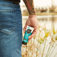 Thumbnail for A man holding a All Good SPF30 Sport 3 oz Mineral Sunscreen Lotion