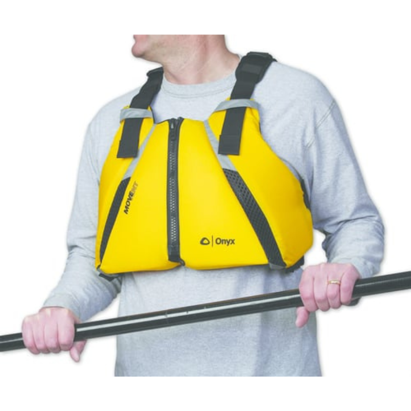 A man wearing Onyx MoveVent Curve Paddle Sports Foam Life Jacket - Yellow