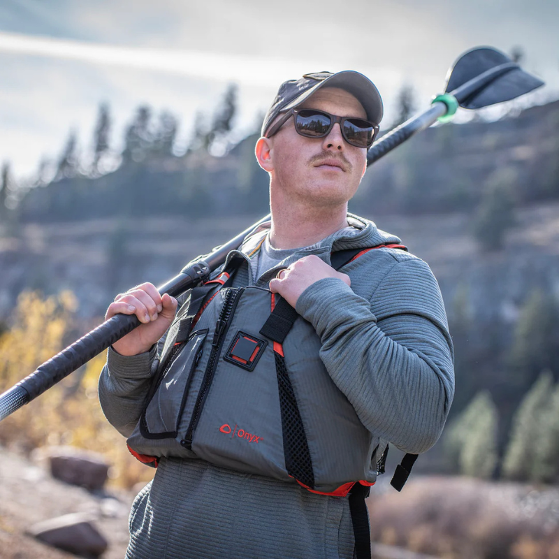 A man wearing Onyx MoveVent Dynamic Foam Life Jacket