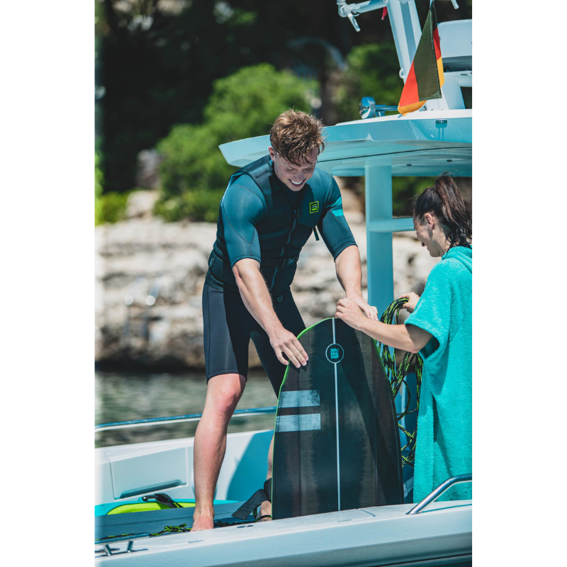 A man wearing a gray Jobe Perth 3/2mm Shorty Back Zip Wetsuit Men