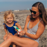 Thumbnail for A mother and her child using Badger 4 oz Aloe Vera After Sun Gel 