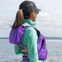 Thumbnail for An woman wearing a Old Town Solitude II Women’s Foam Life Jacket - Grape