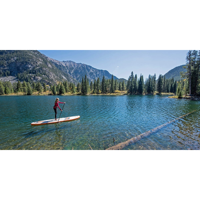 A person Riding a Advanced Elements 11' Hula Inflatable Paddle Board SUP