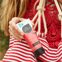 Thumbnail for A person holding All Good SPF30 Kids Mineral Sunscreen Lotion SPF30