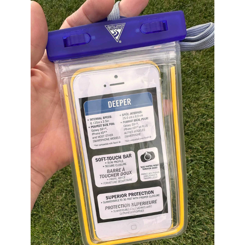 A person holding a Seattle Sports E‑merse Deeper 32" Waterproof Phone Case