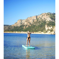 Thumbnail for A person on Aqua Marina 8’2” Peace 2020 Fitness Inflatable Floating Yoga Mat
