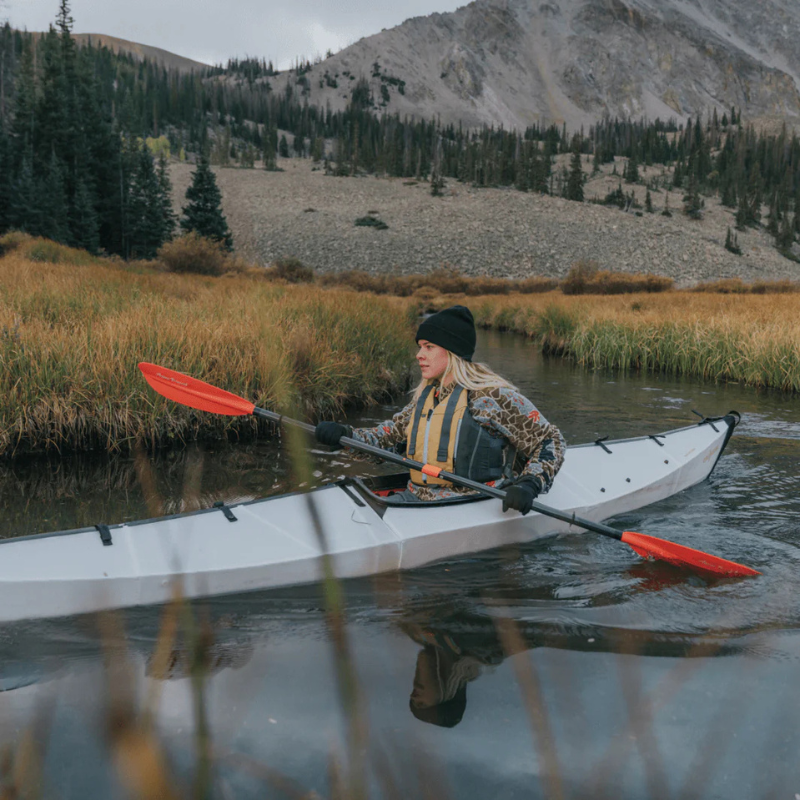 Two Persons are rowing a kayak with Sting Ray Hybrid 2-Piece Posi-Lok Red Kayak Paddles