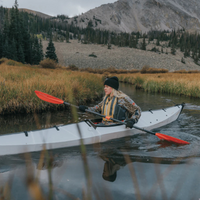 Thumbnail for Two Persons are rowing a kayak with Sting Ray Hybrid 2-Piece Posi-Lok Red Kayak Paddles