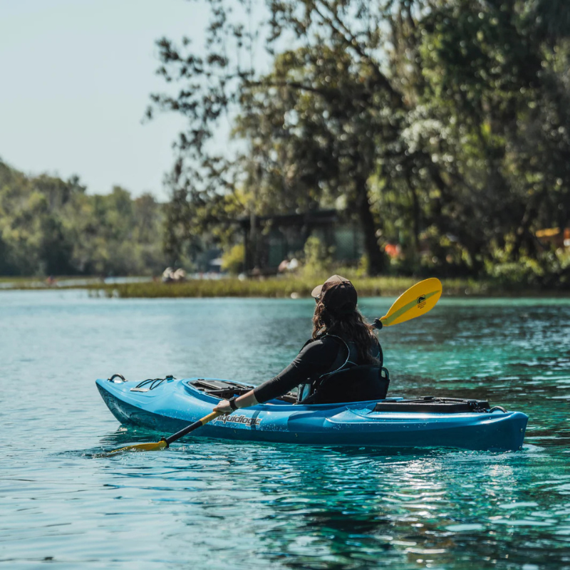 A person using Bending Branches Bounce 2pc Kayak Paddle — Yellow