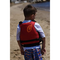 Thumbnail for A young boy Old Town Inlet Jr Kids' Foam Life Jacket – Red back view