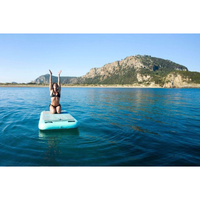 Thumbnail for Early morning yoga with Aqua Marina 8’2” Peace 2020 Fitness Inflatable Floating Yoga Mat