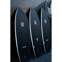 Thumbnail for Lifestyle Image of Surfboard Trading Co. Swallow Fish Carbon Bomb Proof Tech Surfboard | High-Performance Fish Shortboard