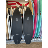 Thumbnail for Lifestyle image of Surfboard Trading Co. Halligan Carbon Bomb Proof Tech Surfboard | High-Performance Shortboard