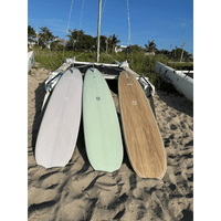 Thumbnail for Lifestyle image of Surfboard Trading Co. Just The Tip Noserider Longboard - Paulownia Gloss | Beginner-Friendly Longboard