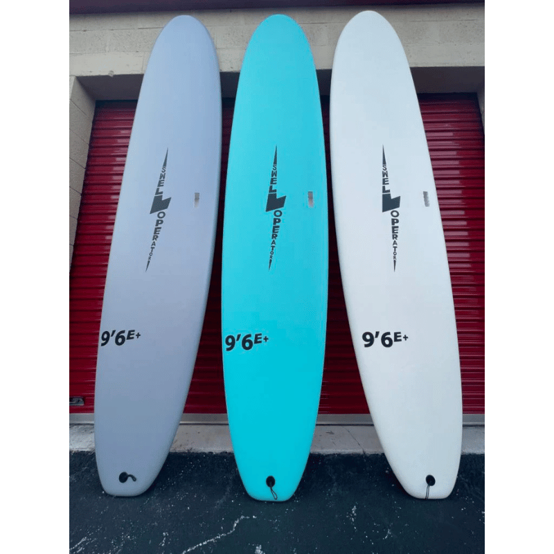 Lifestyle image of Surfboard Trading Co. Swell Operator 9'6" Soft Top Foam Surfboard – Slate | EPS Core Longboard