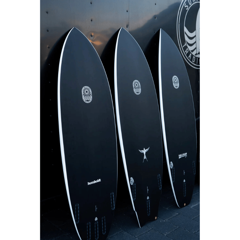 Lifestyle photo of Surfboard Trading Co. Humboldt Carbon Bomb Proof Tech Surfboard | All-Around Shortboard