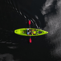 Thumbnail for Overhead view of a person in a kayak using Manta Ray Fiberglass 2-Piece Snap-Button Kayak Paddle