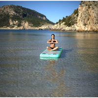 Thumbnail for Relaxing on Aqua Marina 8’2” Peace 2020 Fitness Inflatable Floating Yoga Mat