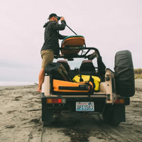 Thumbnail for SealLine PRO Zip 40L Dry Duffle Bag — Orange on the back of a car