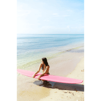 Thumbnail for Surfboard Trading Co. Chosen One Noserider Surfboard – Hot Pink | High-Performance Longboard Lifestyle Image