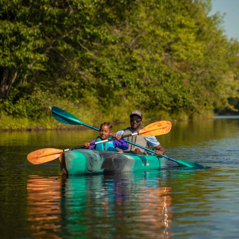 Two People using Carlisle Saber Kid's Paddles to row a Kayak