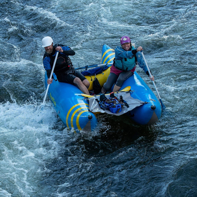 Two people riding a Badfish Hammer Paddle Cat with PVC Splash Guard