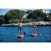 Thumbnail for Two people riding Jobe Aero Yarra 10’6” Inflatable Paddle Board iSUP Red