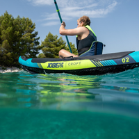 Thumbnail for a man riding a Croft Inflatable Teal Kayak 