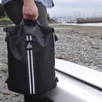 Thumbnail for a man carrying a Seattle Sports Mesh Deck Bag — Black