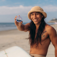 Thumbnail for a man holding a Badger SPF 50 Adventure 2.4 oz Mineral Sunscreen Tin