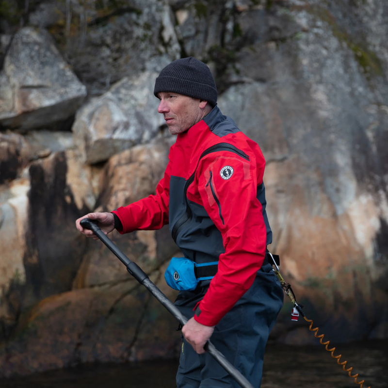 a man using Mustang Survival Minimalist Manual Inflatable Belt Pack- Azure