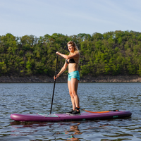 Thumbnail for an woman riding Jobe Aero Lina 10’ Inflatable Paddle Board