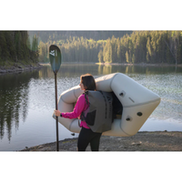 Thumbnail for a person carrying the Kokopelli XPD 7’ Inflatable Granite boat