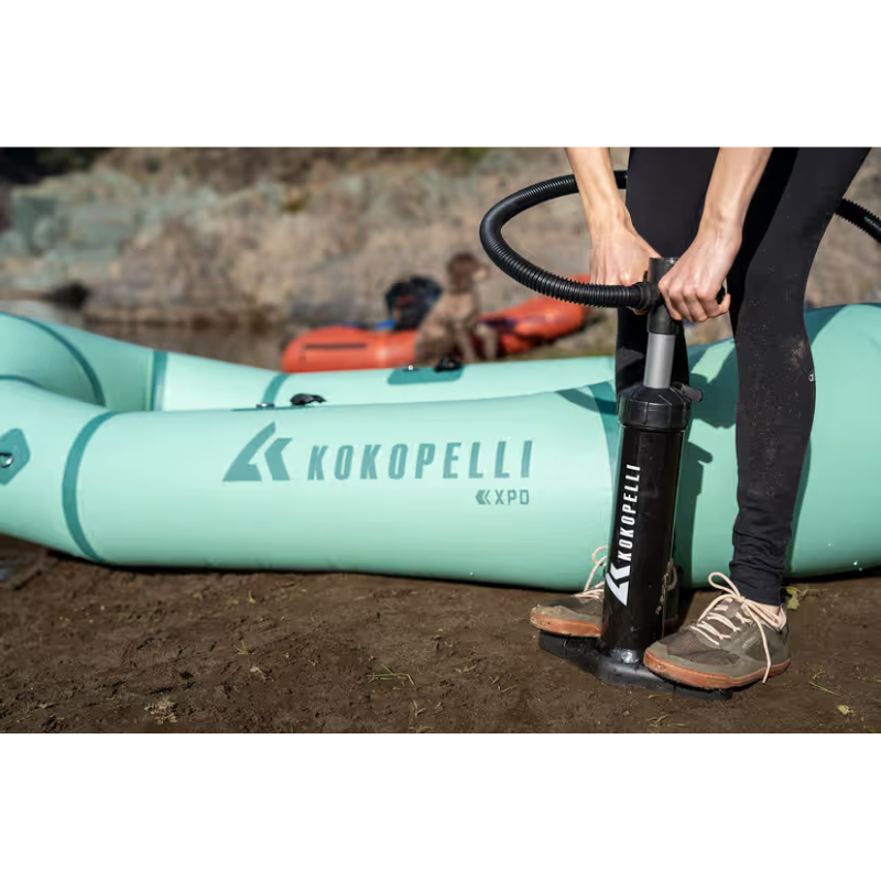 a person inflating Kokopelli XPD sage inflatable boat 