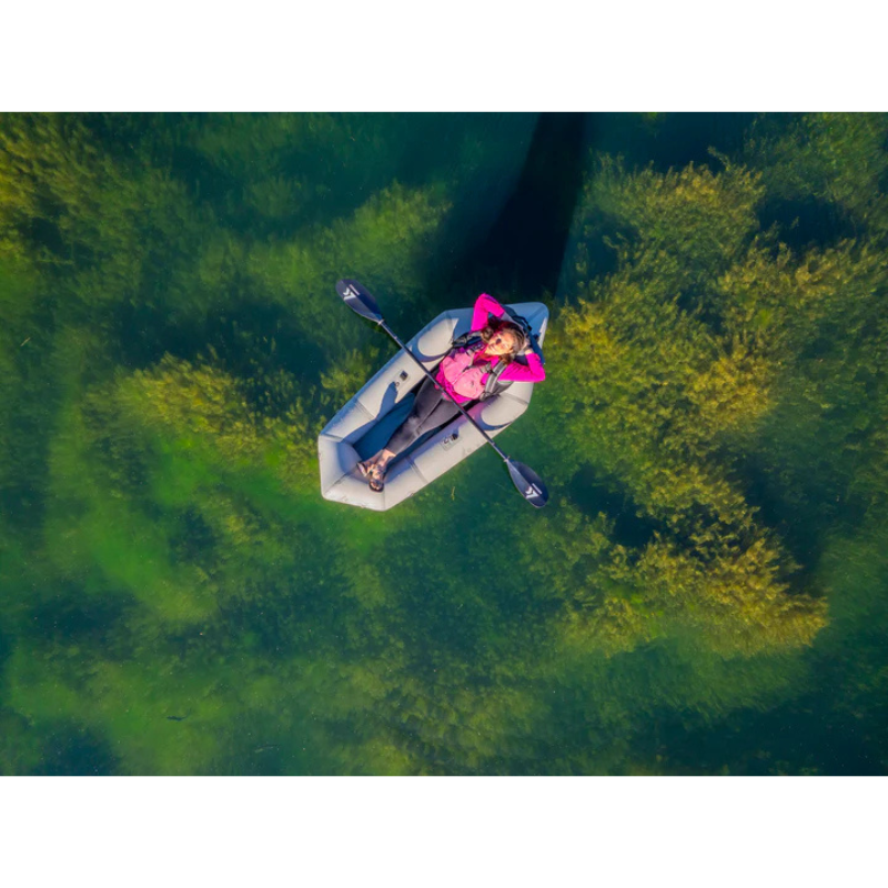 a person relaxing on Kokopelli XPD 7’ Inflatable Boat Granite
