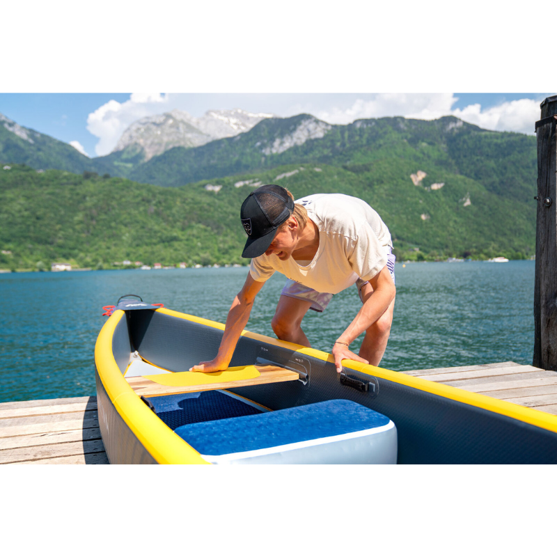 expert checking canoe