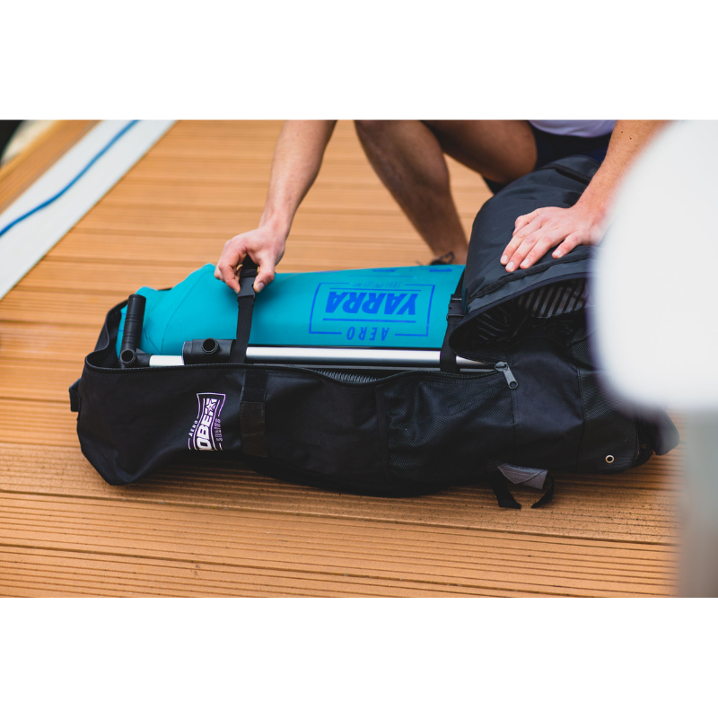 putting a SUP in a Jobe Aero Inflatable Paddle Board SUP Travel Bag