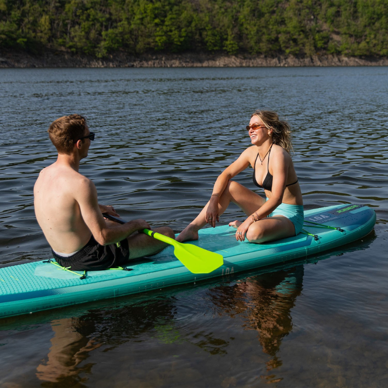 two person relaxing on a Jobe Aero Loa 11’6” Inflatable Paddle Board iSUP