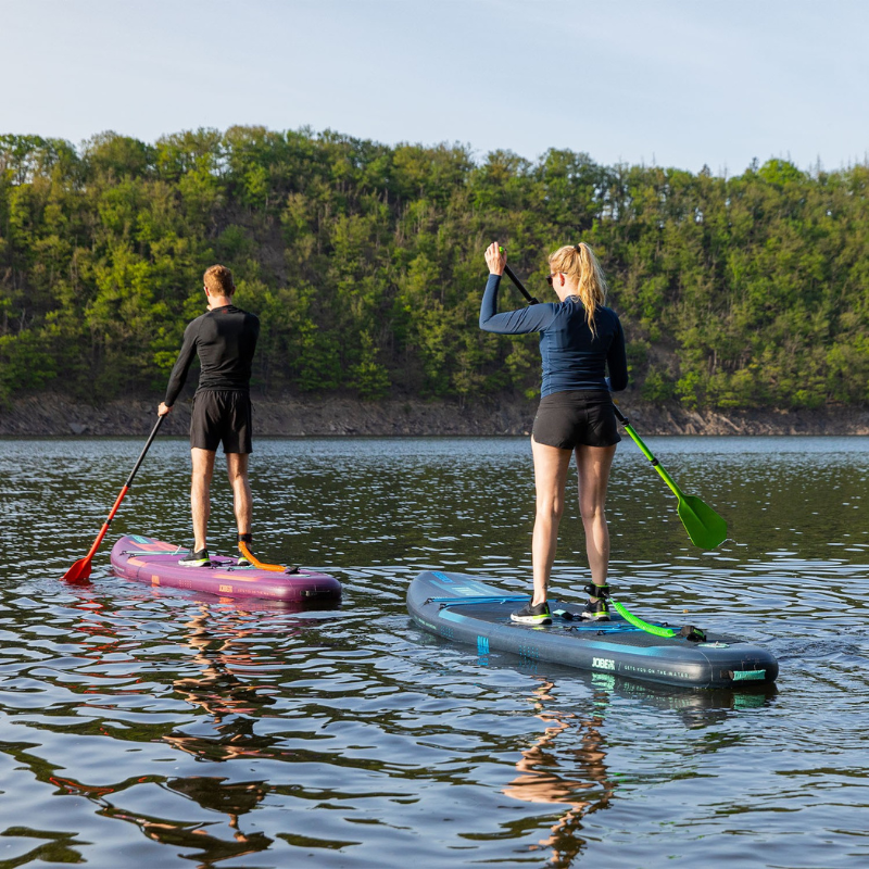two persons riding Jobe Aero Duna 11’6” Inflatable Paddle Board iSUPs