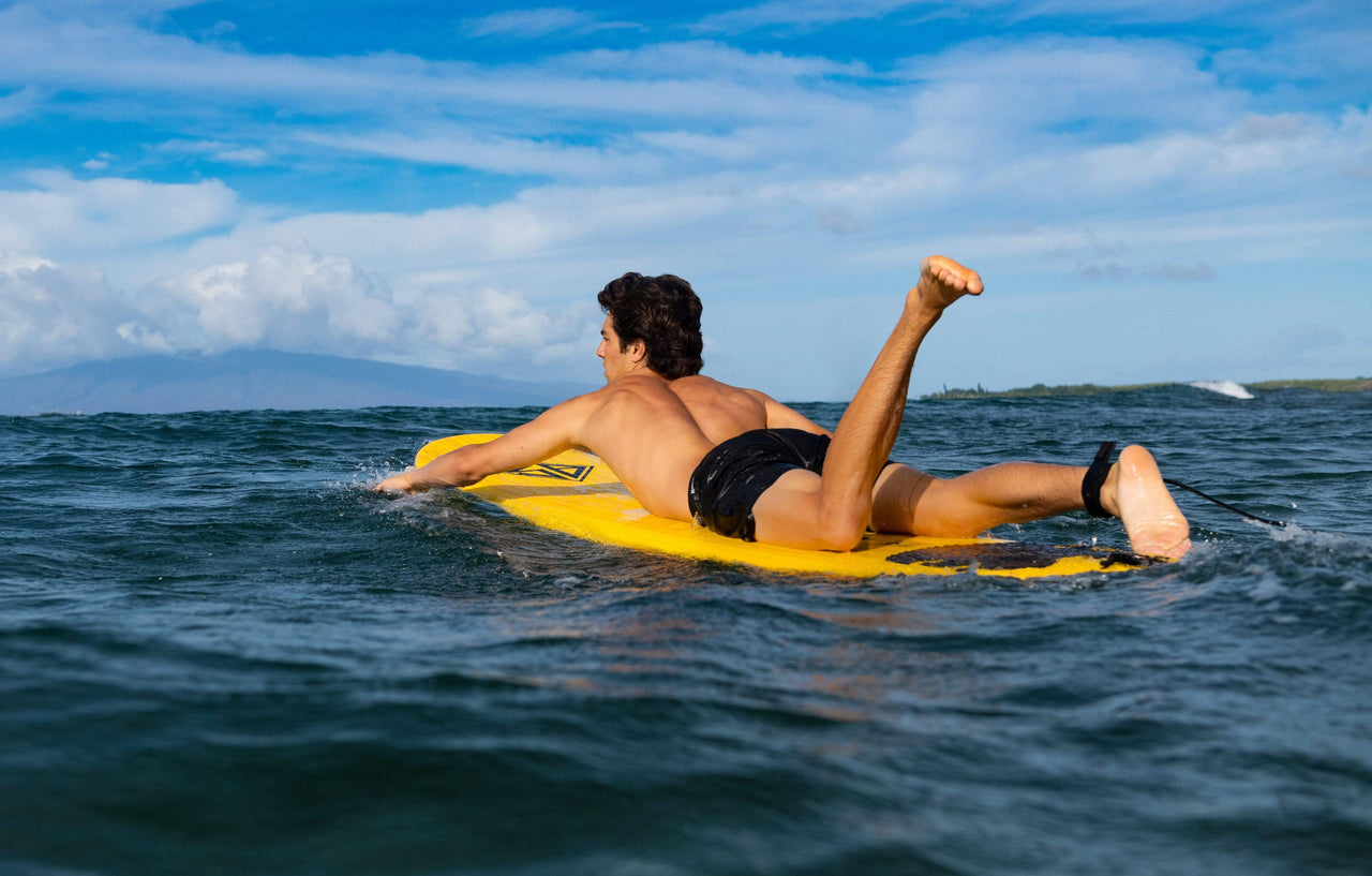 9' Scott Burke Baja Foam Surfboard paddling